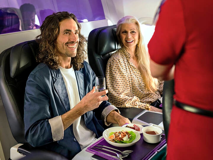 Person enjoying 'The Business' on board a Virgin Australia aircraft